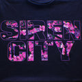 Detail Close-Up of Floral print within Siren City text logo